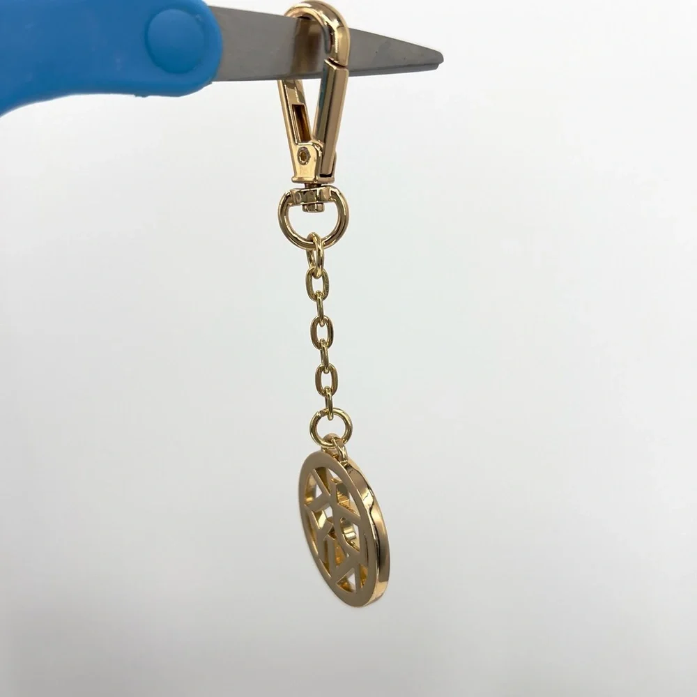 DKNY Donna Karan Gold Plated Logo Keychain Tag